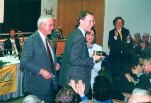 Photo of Landon and Lavinia Clay with Andrew Wiles at the CMI opening event in 1999.